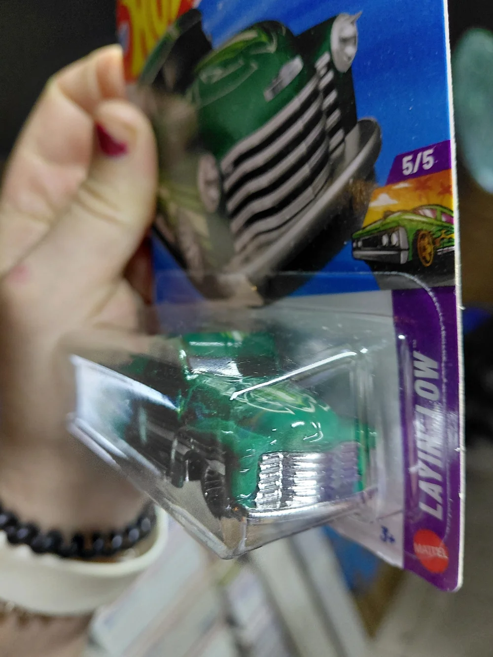 green Hot Wheels La Troca is a 1:64 scale die-cast lowrider pickup truck from th